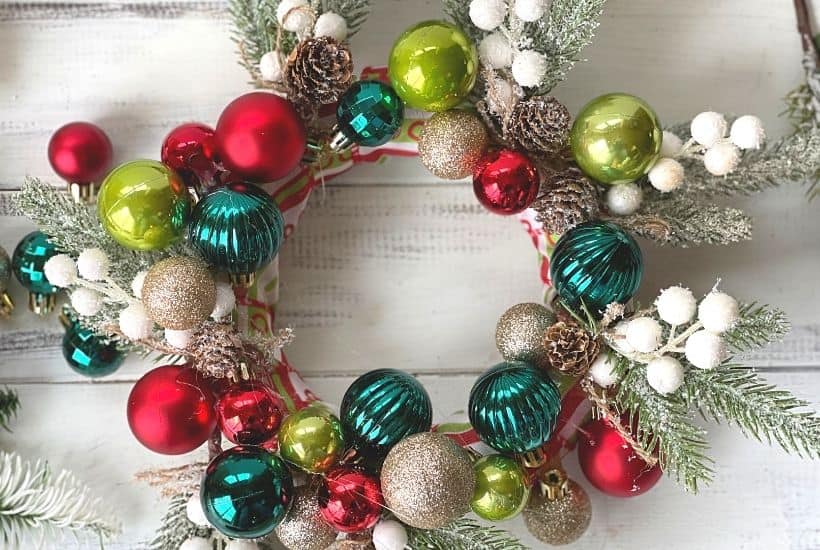 Deck the halls this holiday season with this DIY @NewJerseyLottery Christmas wreath. #Ad This unique ornament wreath is a great gift idea for friends and family too. What a perfect way to share some luck this holiday season. Hop on over to the blog and learn how to make this easy DIY holiday craft with New Jersey Lottery Holiday Scratch Offs. #AnythingCanHappenInJersey