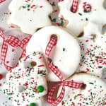 Learn how to make delicious cookies that look like decorative holiday ornaments with this recipe for Christmas Ornament Sugar Cookies. Not only do they look impressive, but they also taste amazing.