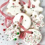 Learn how to make delicious cookies that look like decorative holiday ornaments with this recipe for Christmas Ornament Sugar Cookies. Not only do they look impressive, but they also taste amazing.