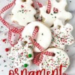 Learn how to make delicious cookies that look like decorative holiday ornaments with this recipe for Christmas Ornament Sugar Cookies. Not only do they look impressive, but they also taste amazing.