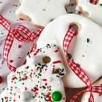 Learn how to make delicious cookies that look like decorative holiday ornaments with this recipe for Christmas Ornament Sugar Cookies. Not only do they look impressive, but they also taste amazing.