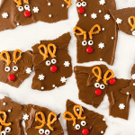 Learn how to make an easy and delicious treat to enjoy with family and friends for the holiday season. You’ll love the chocolatey taste of this sweet and simple chocolate Reindeer Bark recipe. This chocolate bark recipe is perfect recipe for a Christmas Cookie Exchange, holiday party or class party.