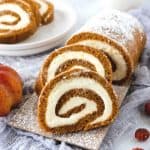 You can't go wrong with a classic pumpkin roll recipe. This easy fall dessert has a soft pumpkin cake filled with a slightly sweet cream cheese filling. Add a dusting of powdered sugar and you have a delicious fall dessert idea.