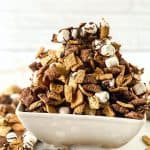 Easily make the perfect snack to enjoy while on the go or when hosting gatherings with loved ones. This S’mores Party Mix tastes great and is easy to prepare within minutes. This easy recipe also makes a great homemade holiday gift idea to give to family and friends.