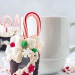 Are you a hot chocolate fan? These Hot Cocoa Bomb Cups are a fun gift to make for the holiday season. Learn how to make this easy DIY holiday food gift. Shaped like actual cups of hot cocoa, Solo Cup Chocolate Bombs are filled with hot cocoa mix, marshmallows and other delicious hot chocolate ingredients (think caramels, and peppermints).