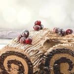 Get ready for the holidays with this fun Traditional Yule Log recipe. The Traditional Yule Log is a popular dessert commonly made during the holiday season in celebration of Christmas. The dessert consists of chocolate cake rolled with buttercream. While it looks like a giant version of a Swiss Roll, it tastes even better and is the perfect dessert to bring with you for any holiday dinners you plan on attending.