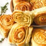 Make the perfect appetizer, lunch, or dinner for yourself and your loved ones with this Savory Mozzarella Stuffed Pinwheels recipe. These pinwheels are cheesy, flavorful, and sure to keep you coming back for more. These pizza roll-ups are a great appetizer recipe, game day snack or easy lunch or meal idea.