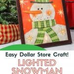 Decorate your home for the holiday season with this easy-to-make Lighted Snowman Picture. It’s fun to put together and perfect for hanging up around the home to get into the holiday spirit. This DIY Christmas craft is made with a gift bag and a dollar store frame. It is a fun dollar store Christmas craft.