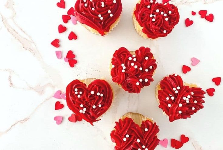 These red heart cupcakes are perfect for Valentine's Day. Learn how to make easy heart-shaped cupcakes to share with family and friends. I also share my best tips on how to freeze cupcakes in this post as well. This easy Valentine cupcake recipe is sure to win the hearts of your family and friends.