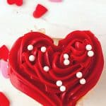 These red heart cupcakes are perfect for Valentine's Day. Learn how to make easy heart-shaped cupcakes to share with family and friends. I also share my best tips on how to freeze cupcakes in this post as well. This easy Valentine cupcake recipe is sure to win the hearts of your family and friends.