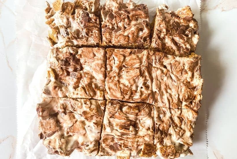 If you love making s'mores by the campfire, then you will love this easy s'mores bars recipe. These tasty and sweet S’mores Treat Bars are easy to make and perfect for a grab-and-go treat. These homemade cereal bars are a perfect snack recipe the family will love. This bar recipe is an easy no-bake dessert for parties and potlucks too.