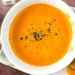 Satisfy your craving for something comforting and flavorful with this delicious Roasted Tomato Soup. Not only is it full of flavor, but it’s also easy to prepare and perfect for lunch, dinner, or even an appetizer. This easy homemade tomato soup recipe goes perfectly with a grilled cheese sandwich. This easy soup recipe is perfect for your lunch or dinner meal plan. It's the ultimate comfort food recipe.