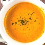 Satisfy your craving for something comforting and flavorful with this delicious Roasted Tomato Soup. Not only is it full of flavor, but it’s also easy to prepare and perfect for lunch, dinner, or even an appetizer. This easy homemade tomato soup recipe goes perfectly with a grilled cheese sandwich. This easy soup recipe is perfect for your lunch or dinner meal plan. It's the ultimate comfort food recipe.