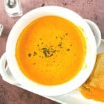 Satisfy your craving for something comforting and flavorful with this delicious Roasted Tomato Soup. Not only is it full of flavor, but it’s also easy to prepare and perfect for lunch, dinner, or even an appetizer. This easy homemade tomato soup recipe goes perfectly with a grilled cheese sandwich. This easy soup recipe is perfect for your lunch or dinner meal plan. It's the ultimate comfort food recipe.