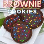 A chocolatey cookie with a chocolate ganache topping and colorful rainbow chips on top will be a showstopper in not only the presentation but in taste! Chocolate lovers definitely need to try this unique and delicious recipe for copycat Crumbl Cosmic Brownie Cookies.