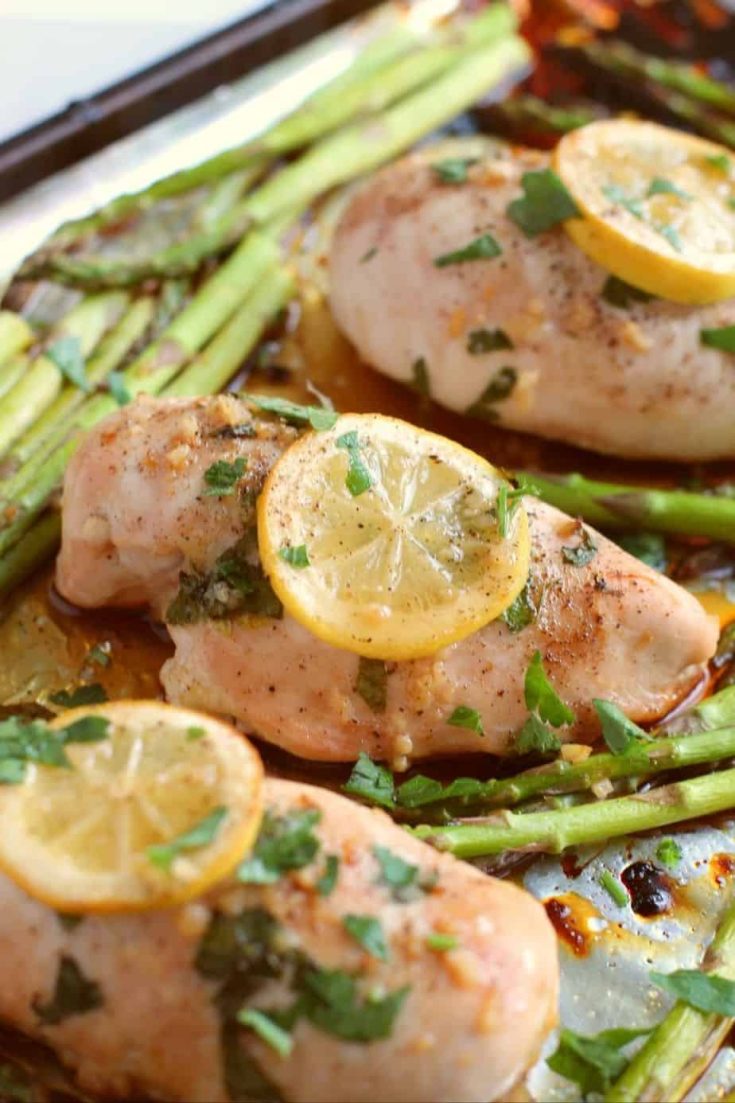 Simple and delicious is the perfect way to describe this easy Sheet Pan Honey Lemon Chicken & Asparagus recipe. This tasty chicken recipe is a simple and flavorful weeknight dinner. It's the perfect meal-in-one! This is an easy sheet pan recipe.
