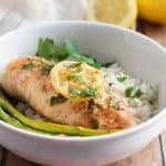 Simple and delicious is the perfect way to describe this easy Sheet Pan Honey Lemon Chicken & Asparagus recipe. This tasty chicken recipe is a simple and flavorful weeknight dinner. It's the perfect meal-in-one! This is an easy sheet pan recipe.