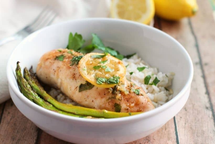 Simple and delicious is the perfect way to describe this easy Sheet Pan Honey Lemon Chicken & Asparagus recipe. This tasty chicken recipe is a simple and flavorful weeknight dinner. It's the perfect meal-in-one! This is an easy sheet pan recipe.