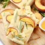 Prepare a light and refreshing treat with this delicious Peach & Rosemary Focaccia Bread. It has the perfect naturally sweet touch with peaches, making it the perfect quick snack to enjoy! Focaccia bread, the Italian-style bread. With this recipe for Peach & Rosemary Focaccia Bread, you’re combining two incredible flavors into one to make bread that has a light, sweet taste and amazing texture that keeps you coming back for more.