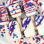 Feeling festive and looking for the perfect treat to prepare for the holidays? Try these tasty and fun Red, White & Blue Cakesicles that are sure to be a huge hit at any gathering you host with your family and friends. Follow this easy step-by-step guide to teach you how to make your own cakesicles. Try this patriotic dessert for your upcoming party.