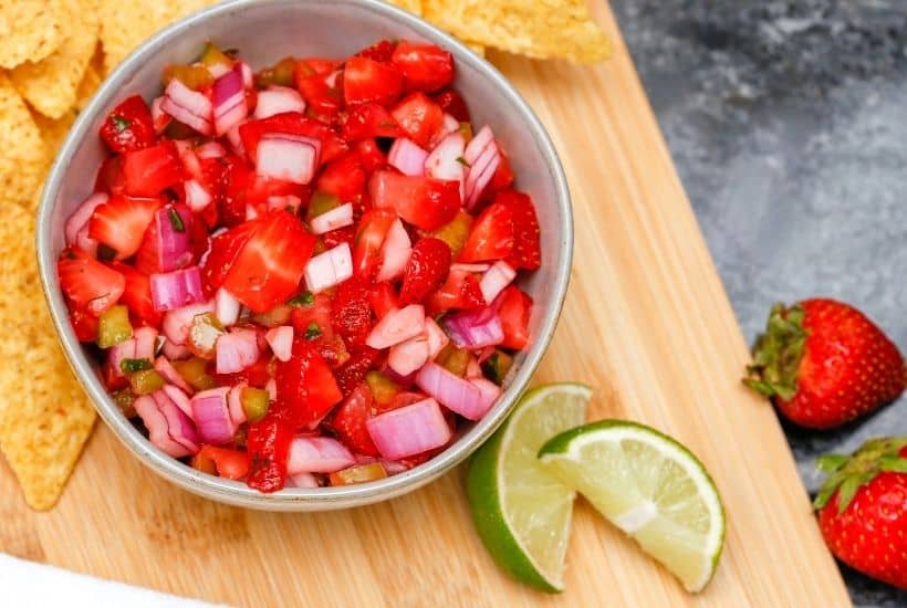 If you’re looking for a zesty, slightly sweet treat to eat with your favorite tortilla trips, try this delicious Strawberry Salsa. It’s light, refreshing, and super flavorful. It's the perfect summer salsa recipe to sink your teeth into.