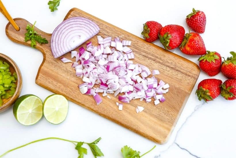 If you’re looking for a zesty, slightly sweet treat to eat with your favorite tortilla trips, try this delicious Strawberry Salsa. It’s light, refreshing, and super flavorful. It's the perfect summer salsa recipe to sink your teeth into.