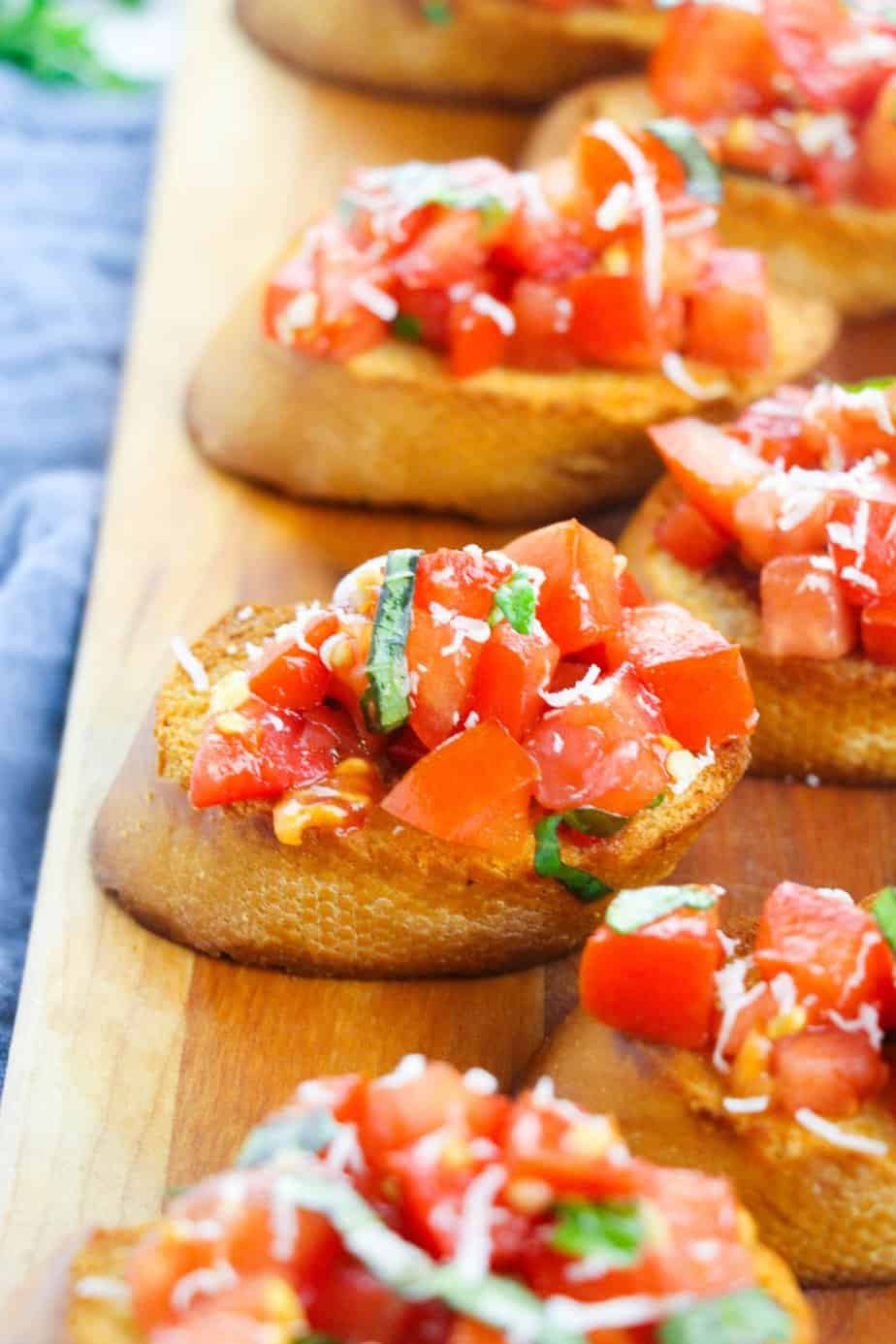 Bruschetta is a classic Italian appetizer that is easy to make at home. Toasted bread is topped with tomatoes, Parmesan cheese, garlic, and fresh basil. If you're looking for something different to serve your guests, consider this Italian classic: Bruschetta. This dish is simple to make and can be tailored to your guests' tastes. This appetizer is nice because it can serve many people and is super inexpensive to make!