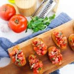 Bruschetta is a classic Italian appetizer that is easy to make at home. Toasted bread is topped with tomatoes, Parmesan cheese, garlic, and fresh basil. If you're looking for something different to serve your guests, consider this Italian classic: Bruschetta. This dish is simple to make and can be tailored to your guests' tastes. This appetizer is nice because it can serve many people and is super inexpensive to make!
