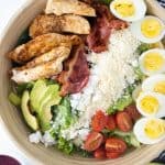 Delicious, light and flavorful is the way to go with this Grilled Chicken Cobb Salad recipe. This easy meal idea is great to take with you when you’re on the go, whether you’re headed to work or traveling. This salad is portable too! This is a great mason jar recipe to take to work or serve at a picnic. Summertime is the perfect time to enjoy salads. This Grilled Chicken Cobb Salad is delicious in so many ways, go ahead and give it a try!
