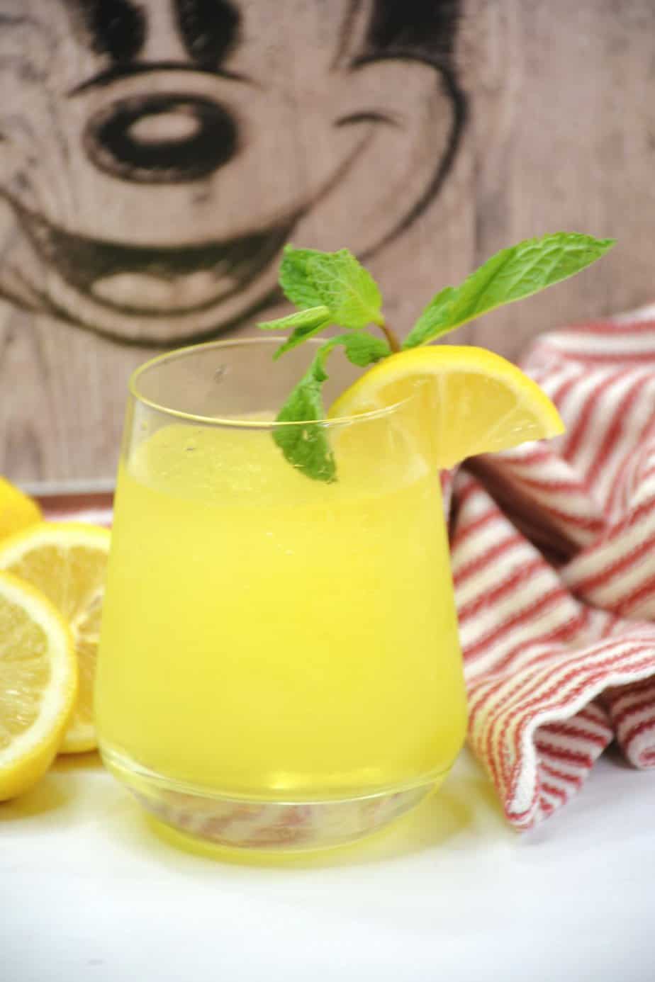 Ready for the drink of the century? This Epcot Limoncello Slush is tart, sweet, and refreshing all at the same time. It's the perfect drink to enjoy on a hot day in Walt Disney World! When you are craving something sweet and cold, this drink hits the spot. Ready for the drink of the century? This Epcot Limoncello Slush is tart, sweet, and refreshing all at the same time. It's the perfect drink to enjoy on a hot day in Walt Disney World! When you are craving something sweet and cold, this drink hits the spot.