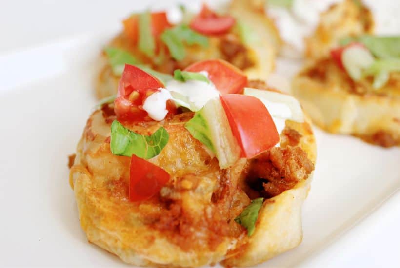 Taco Roll-ups are a fun and easy way to enjoy two classic dishes at once! This recipe combines the best of both worlds, giving you a pizza-like dish with all the flavors of tacos.