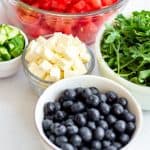 Watermelon Feta Arugula Salad is the perfect summer salad! The sweetness of the watermelon pairs perfectly with the salty feta, and the peppery arugula gives it a nice bite. If you're looking for a delicious summer salad, then this Watermelon Feta Arugula Salad is just what you've been looking for! It also makes a great patriotic recipe for your 4th of July party.