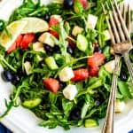 Watermelon Feta Arugula Salad is the perfect summer salad! The sweetness of the watermelon pairs perfectly with the salty feta, and the peppery arugula gives it a nice bite. If you're looking for a delicious summer salad, then this Watermelon Feta Arugula Salad is just what you've been looking for! It also makes a great patriotic recipe for your 4th of July party.
