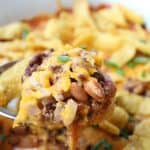 Looking for a simple easy weeknight dinner that the entire family can enjoy? You'll want to grab a bag of Fritos and try this easy and delicious Walking Taco Casserole!