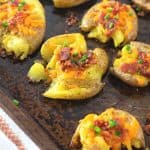 Discover how to easily prepare the perfect side dish with this recipe for Bacon Cheddar Smashed Potatoes. They’re cheesy, crispy, and have the best texture that will keep you coming back for more. This is an easy potato side dish that everyone will enjoy.