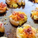 Discover how to easily prepare the perfect side dish with this recipe for Bacon Cheddar Smashed Potatoes. They’re cheesy, crispy, and have the best texture that will keep you coming back for more. This is an easy potato side dish that everyone will enjoy.