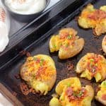 Discover how to easily prepare the perfect side dish with this recipe for Bacon Cheddar Smashed Potatoes. They’re cheesy, crispy, and have the best texture that will keep you coming back for more. This is an easy potato side dish that everyone will enjoy.