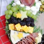 Charcuterie boards are a great party appetizer idea, especially during the holiday season. This festive, and delicious Christmas Wreath Charcuterie Board will wow your guests for the holidays.