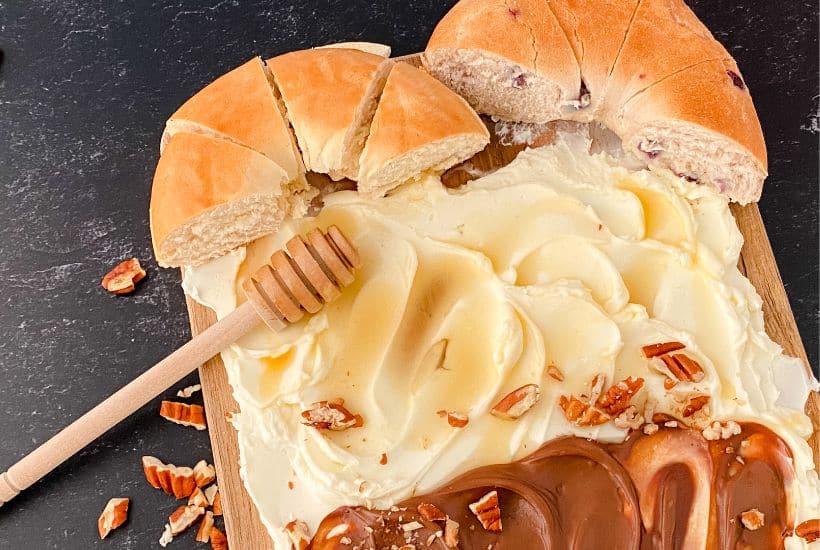 You’ve likely heard of butter boards, but what about a Cream Cheese Bagel Board? If you’re a bagel lover who looks forward to spreading them with cream cheese, you will love this easy-to-assemble board. This fun version of a charcuterie board is a great breakfast or brunch recipe idea.