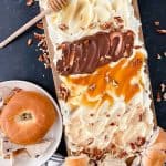 You’ve likely heard of butter boards, but what about a Cream Cheese Bagel Board? If you’re a bagel lover who looks forward to spreading them with cream cheese, you will love this easy-to-assemble board. This fun version of a charcuterie board is a great breakfast or brunch recipe idea.