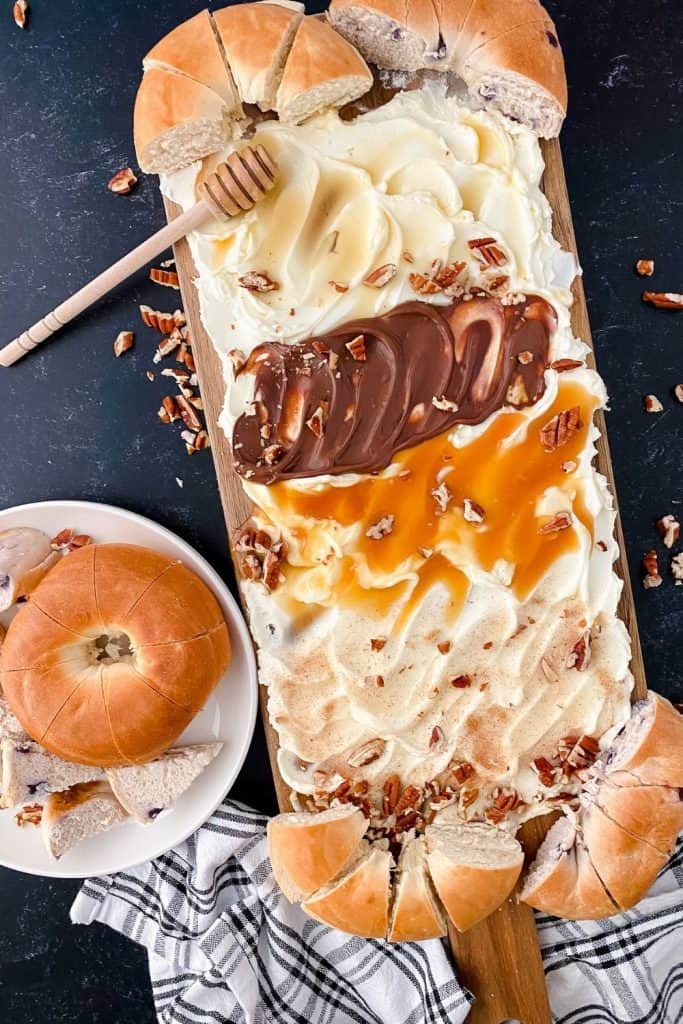 You’ve likely heard of butter boards, but what about a Cream Cheese Bagel Board? If you’re a bagel lover who looks forward to spreading them with cream cheese, you will love this easy-to-assemble board. This fun version of a charcuterie board is a great breakfast or brunch recipe idea.