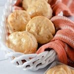 When craving light and fluffy biscuits, give this Honey Butter Biscuits recipe a try. They have the perfect taste and texture, pairing perfectly with all kinds of flavorful meals. These soft and flaky buttermilk biscuits are brushed with homemade honey butter.