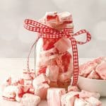 These Peppermint Marshmallows are simple to make and delicious to consume. Holiday treats are so easy to do thanks to this recipe. This homemade marshmallow recipes is a perfect DIY gift idea for the holidays. Wrap them up with a mug and a packet of hot chocolate for an easy food gift idea.