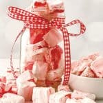 These Peppermint Marshmallows are simple to make and delicious to consume. Holiday treats are so easy to do thanks to this recipe. This homemade marshmallow recipes is a perfect DIY gift idea for the holidays. Wrap them up with a mug and a packet of hot chocolate for an easy food gift idea.