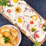 Butter boards are a new rage. You simply spread butter on a board and from there, you can add flavorings, seasonings, or dip whatever you'd like into the butter. You've heard of the charcuterie board, but this butter board is changing the appetizer scene. Learn how to make a butter board.