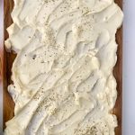 Butter boards are a new rage. You simply spread butter on a board and from there, you can add flavorings, seasonings, or dip whatever you'd like into the butter. You've heard of the charcuterie board, but this butter board is changing the appetizer scene. Learn how to make a butter board.