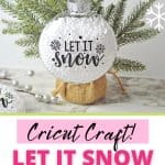 Who says you need the most expensive ornaments to make your Christmas tree look amazing? Learn how to easily create the most beautiful Let It Snow Ornament to hang on the tree or give as a gift. This DIY Ornament is an easy holiday Cricut Craft Idea. It is a great homemade Christmas gift craft idea.