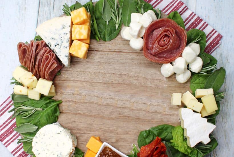 Charcuterie boards are a great party appetizer idea, especially during the holiday season. This festive, and delicious Christmas Wreath Charcuterie Board will wow your guests for the holidays.