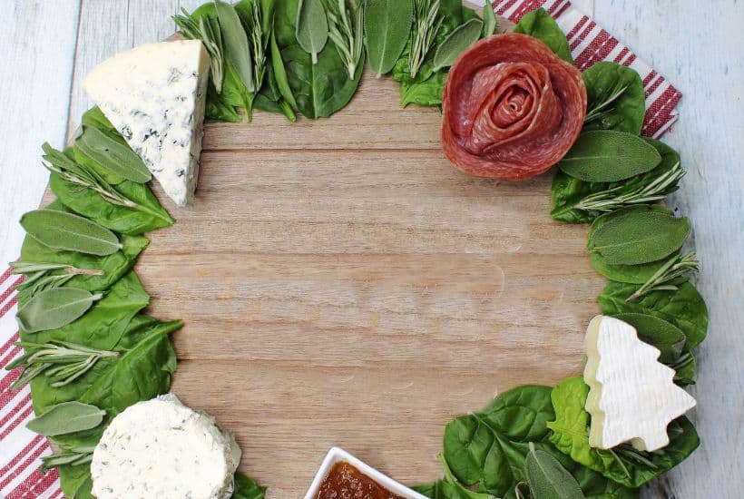 Charcuterie boards are a great party appetizer idea, especially during the holiday season. This festive, and delicious Christmas Wreath Charcuterie Board will wow your guests for the holidays.