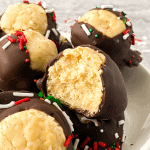 Want a delicious no bake candy for the holidays? These Buckeyes are so tasty and easy to make, you just need a few ingredients. This Best Buckeye Recipe is a sure way to please a crowd. They are the perfect holiday treat.